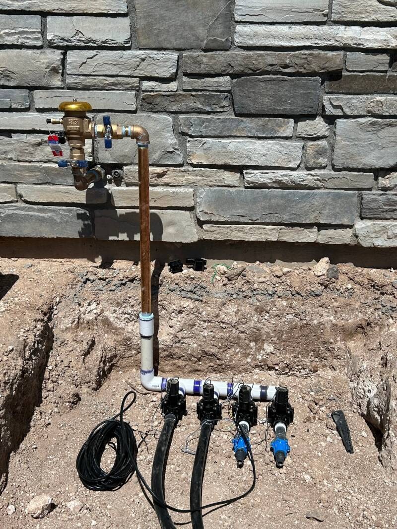 Irrigation valve manifold and backflow preventer installation